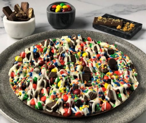 chocolate pizza loaded with colorful candies