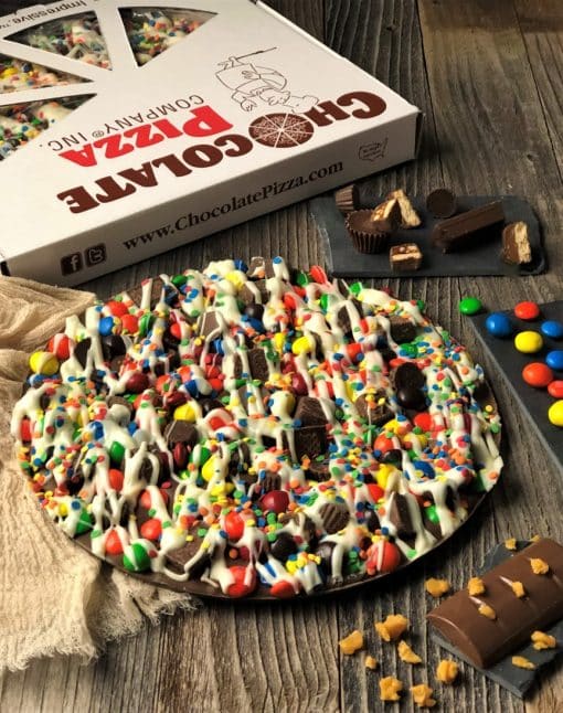 candy avalanche chocolate pizza topped with candies