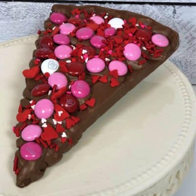 chocolate pizza slice with Valentines candy