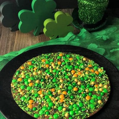 lucky for you chocolate pizza with green gold candy topped chocolate pizza with shamrock table decorations