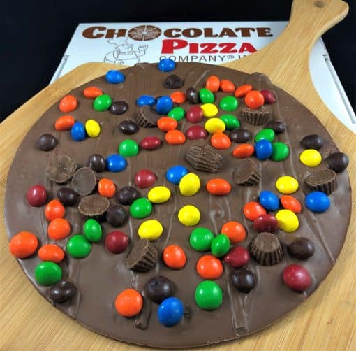 Chocolate Pizza with peanut butter cups and colorful peanut butter candy