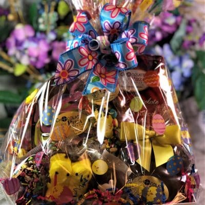 Easter basket with swirled Easter Egg and chocolates