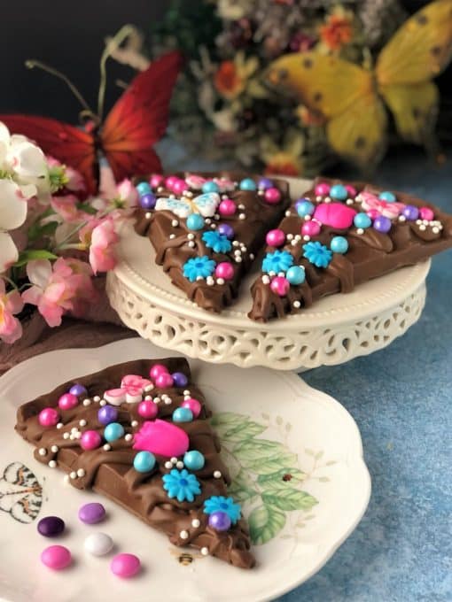 3 slices of chocolate pizza with flowers for mom sugar decorations